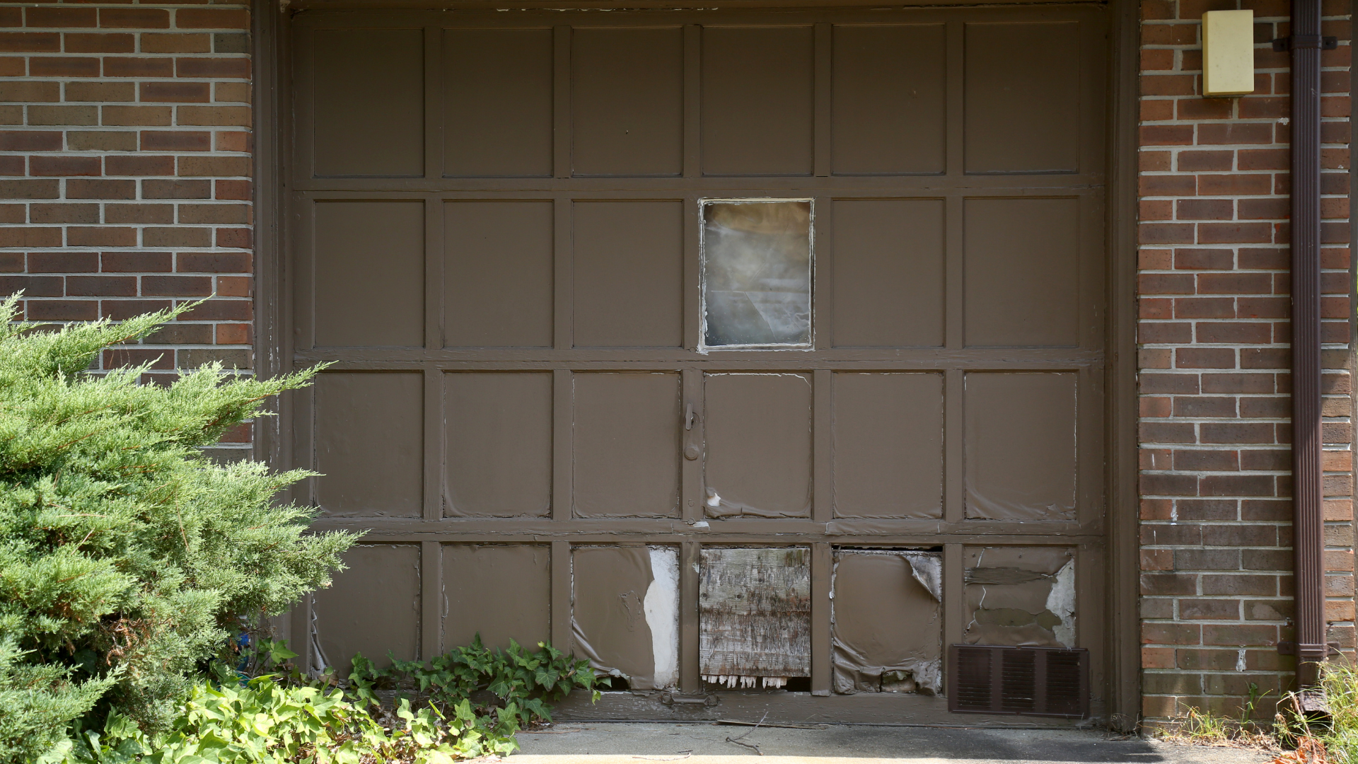 damaged garage door replacement